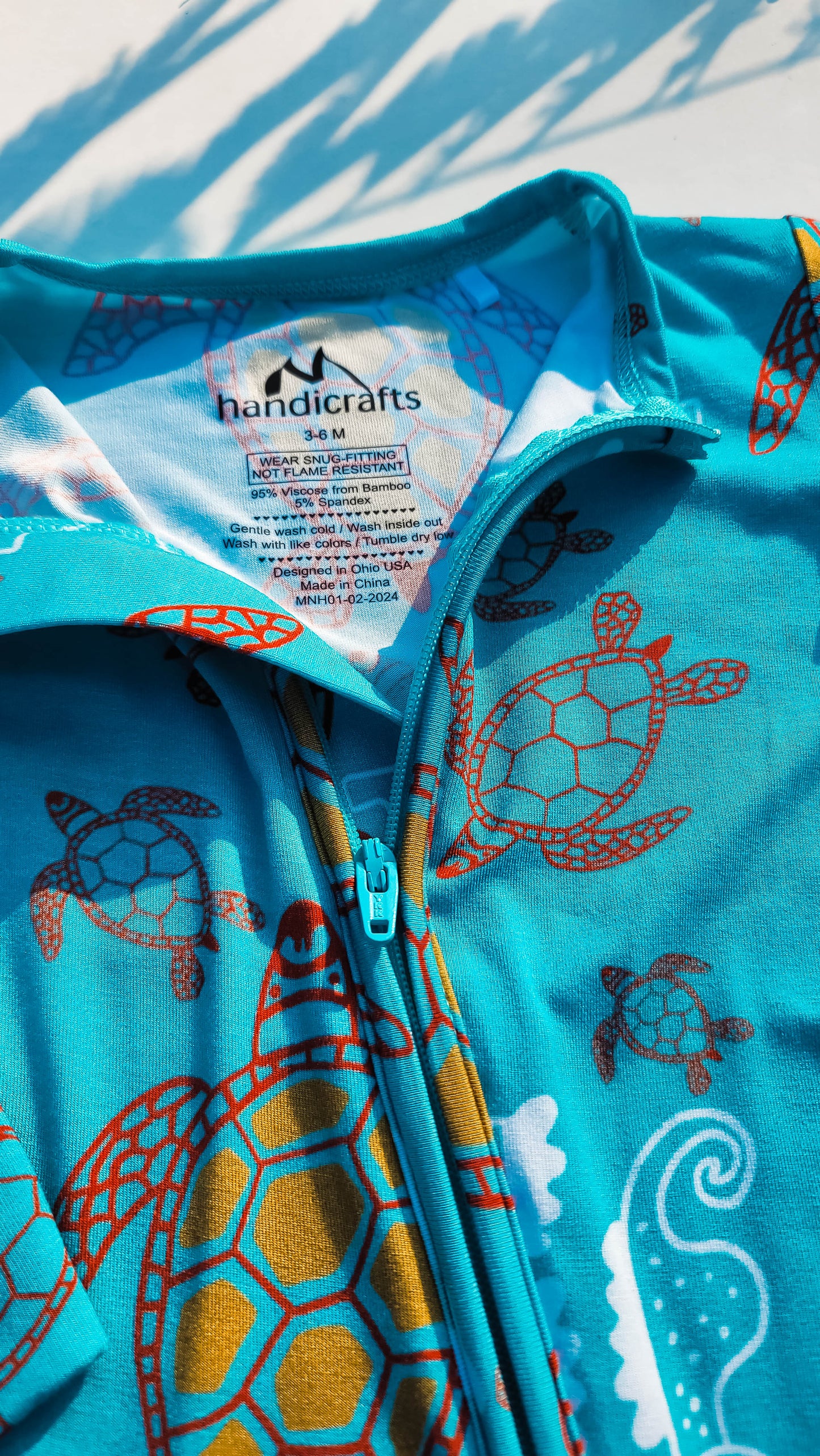 Swimmers: Long Sleeved Footed Zippies Set of 2